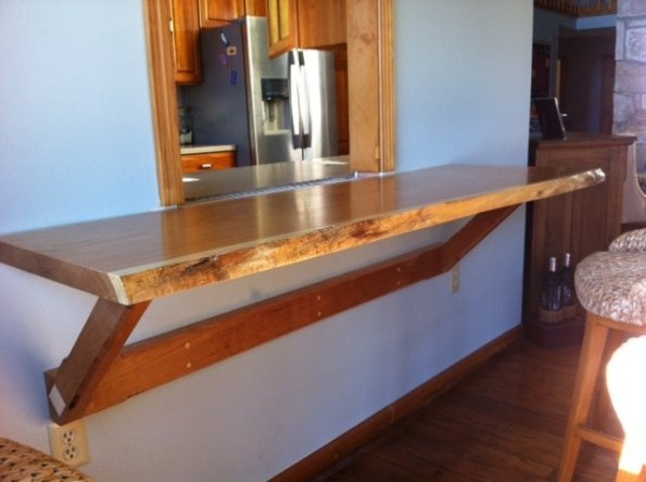 Butternut slab finished and installed by Herrle Custom Carpentry